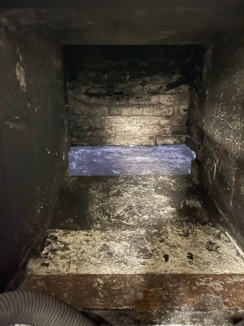 Inside of a sooty firebox before cleaning