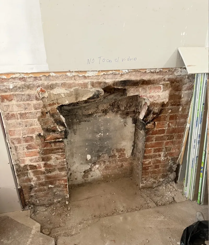 Damaged brick firebox before the rebuild