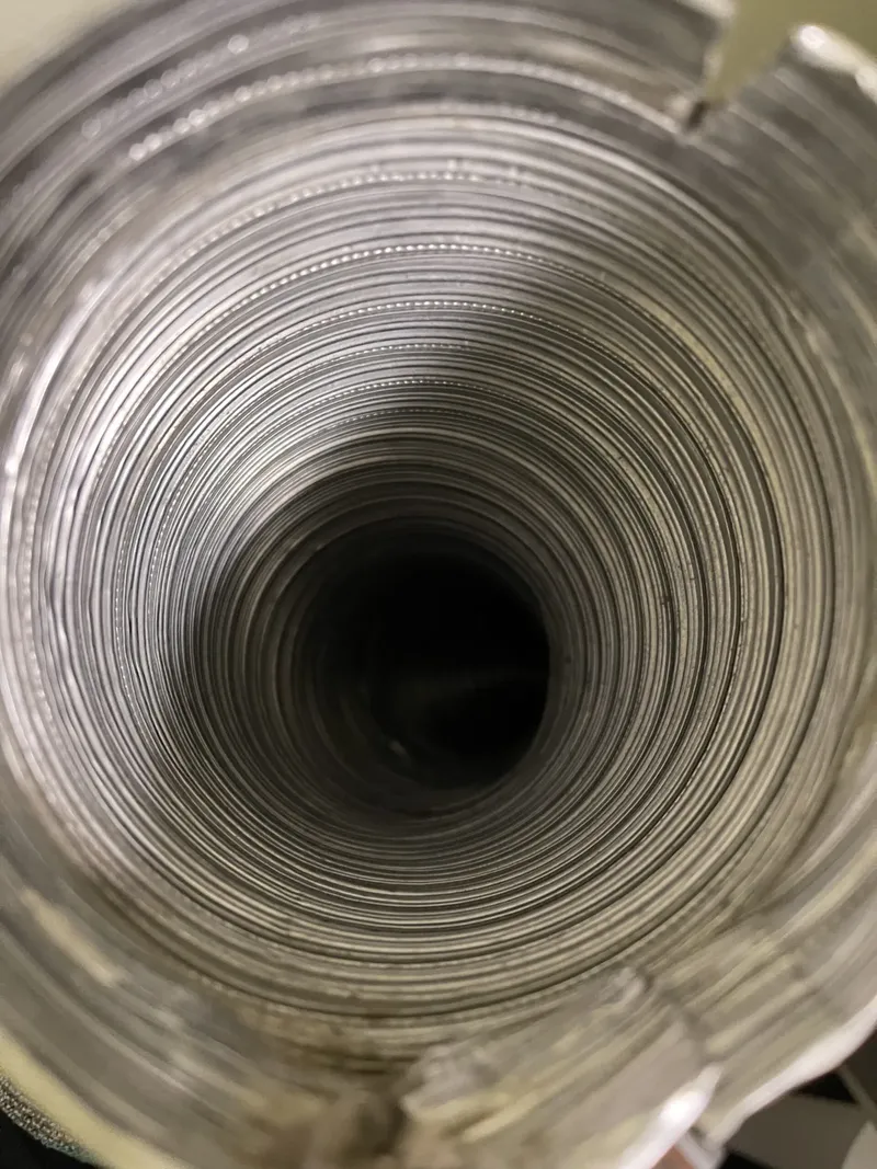 View down a new stainless steel chimney liner